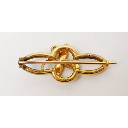 12 - A 15ct gold sapphire and pearl set brooch, gross weight 3.7g. UK shipping £14.