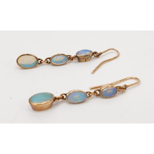 17 - A pair of yellow metal opal set earrings, gross weight 1.2g. UK shipping £14.