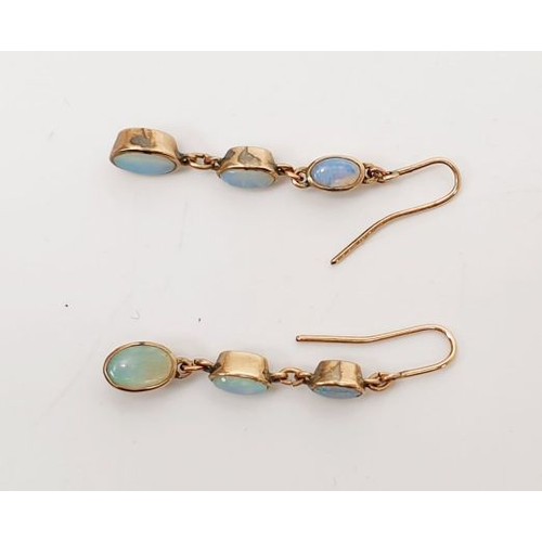 17 - A pair of yellow metal opal set earrings, gross weight 1.2g. UK shipping £14.