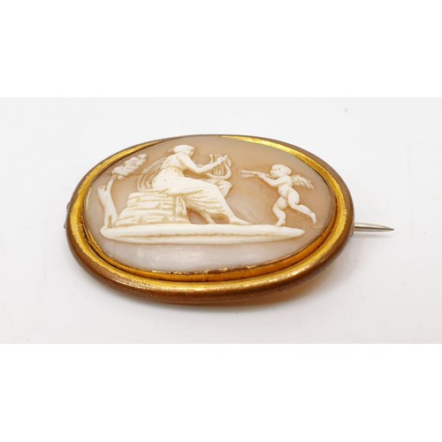 19 - An antique cameo brooch set in a gold plated mount A/F, width 1.25