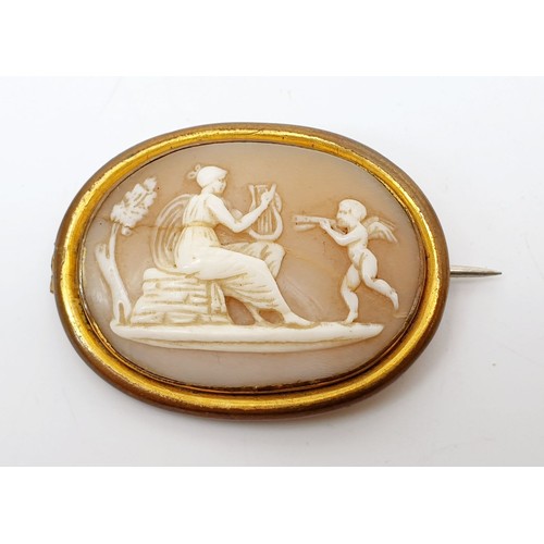 19 - An antique cameo brooch set in a gold plated mount A/F, width 1.25