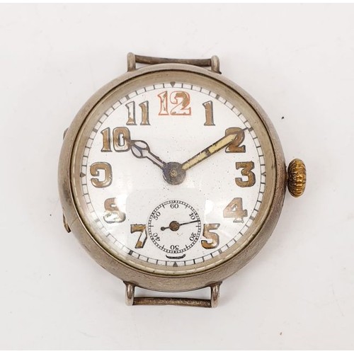 52 - An early continental silver cased wrist watch, London import hallmark 1919, diameter 1.25