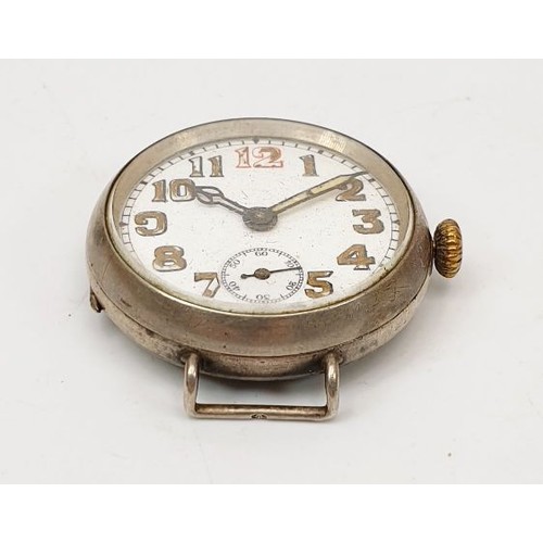 52 - An early continental silver cased wrist watch, London import hallmark 1919, diameter 1.25