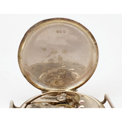 52 - An early continental silver cased wrist watch, London import hallmark 1919, diameter 1.25