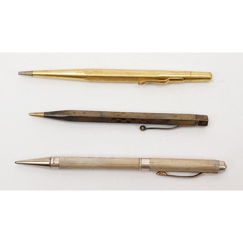 56 - A silver hallmarked propelling pencil, Birmingham 1971 together with a silver plated propelling penc... 