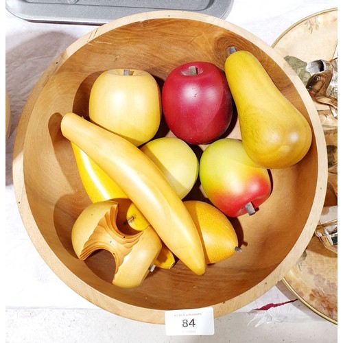 84 - A wooden fruit bowl with artificial wooden fruit, diameter 11