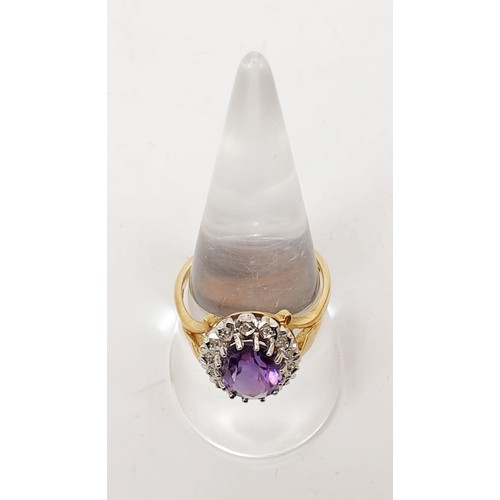 120 - A hallmarked 9ct gold ring set with diamonds and an amethyst, gross weight 3.4g, size R. UK shipping... 