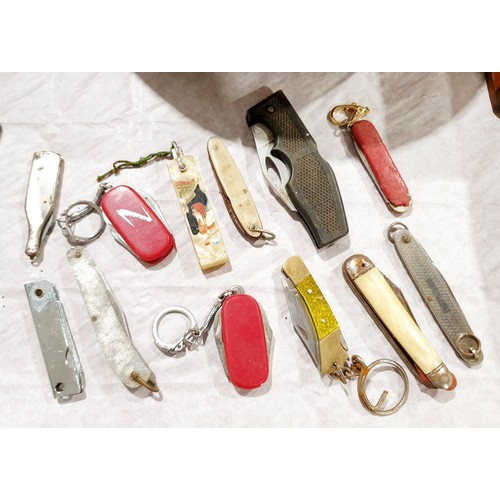 175 - A selection of penknives and bottle openers. UK shipping £14.