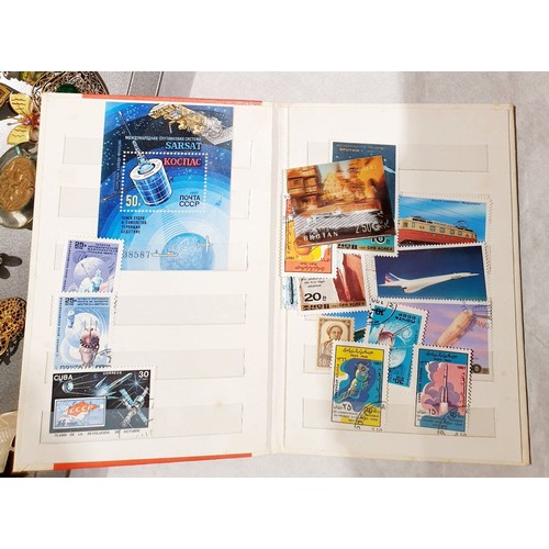 201 - A stamp book with Soviet stamps. UK shipping £14.