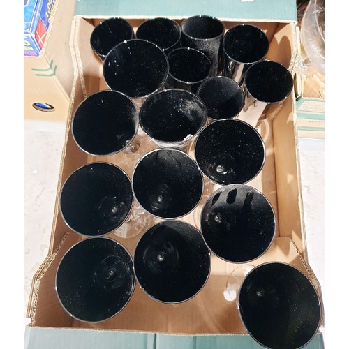 214 - A box of black and clear wine glasses. No shipping. Arrange collection or your own packer and shippe... 