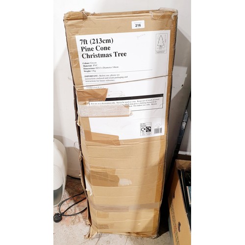 216 - A 7' Christmas tree. No shipping. Arrange collection or your own packer and shipper, please. Electri... 