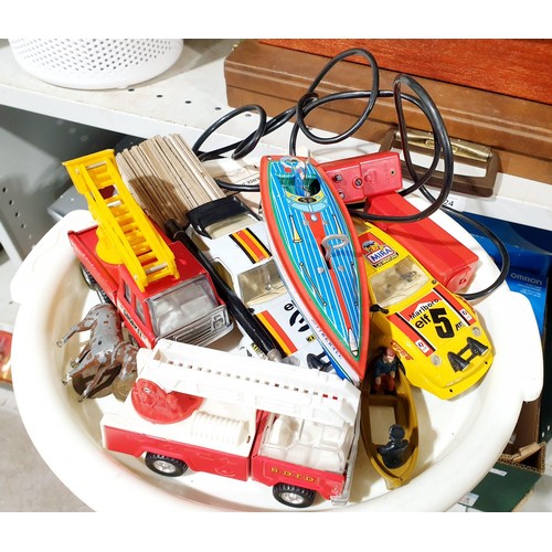 223 - Vintage toys together with a wooden crate. No shipping. Arrange collection or your own packer and sh... 