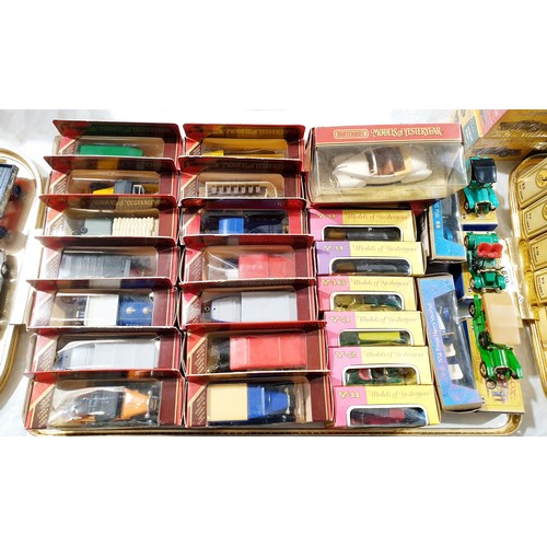 239 - Three boxed vintage Matchbox cars together with boxed Models of Yesteryear cars. UK shipping £14.