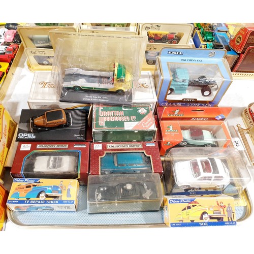 248 - A selection of boxed toy vehicles. UK shipping £14.