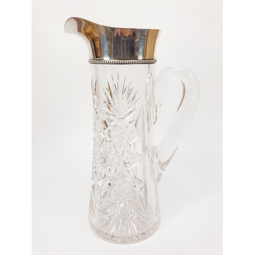 262 - A cut crystal and hallmarked silver ewer A/F, height 10.5