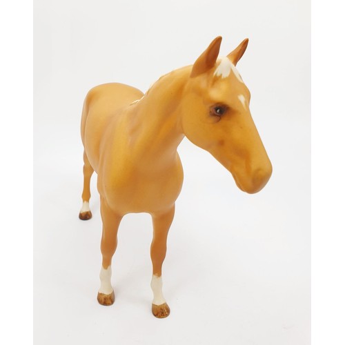 264 - A Beswick model of a horse, height 8