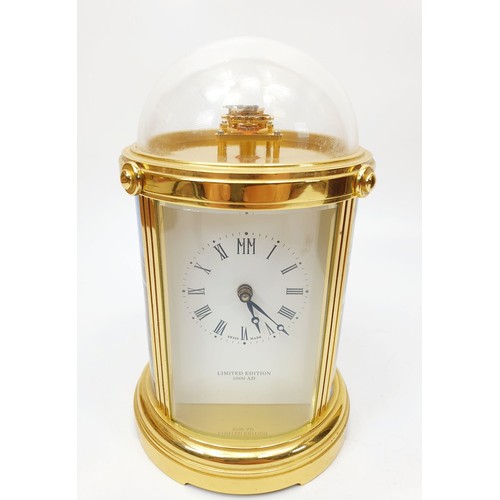 270 - A boxed The London Clock Company, a limited edition millennium carriage clock with certificate, heig... 