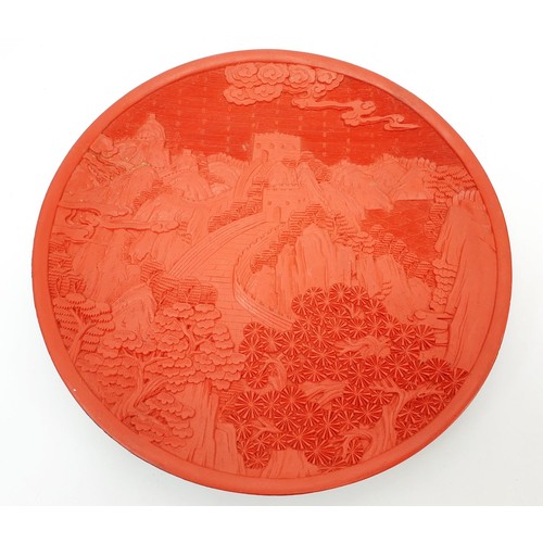 284 - A Chinese cinnabar plate, diameter 9.5