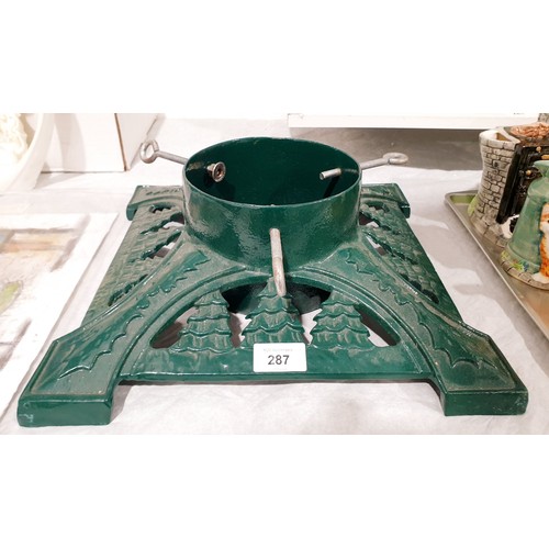 287 - A cast iron Christmas tree base, 14