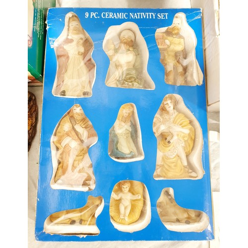 289 - A boxed ceramic Nativity set together with a Christmas ornament. No shipping. Arrange collection or ... 