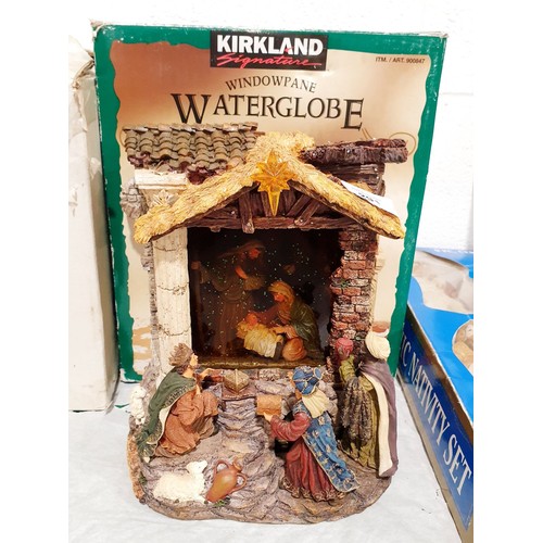 291 - A Kirkland battery operated and musical Christmas water globe, height 10