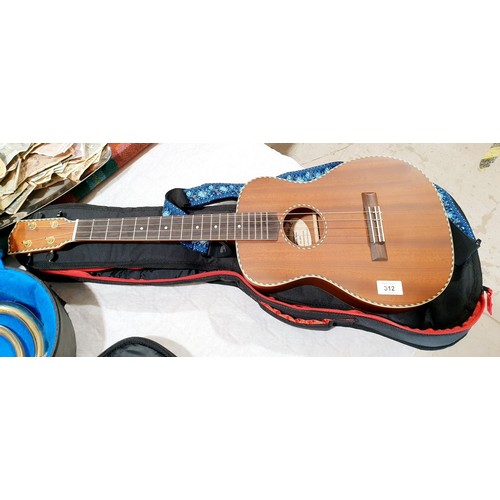 312 - A Mainland baritone ukulele with soft case. No shipping. Arrange collection or your own packer and s... 