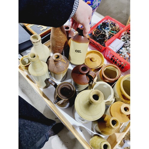 129 - A selection of antique and later stoneware bottles and containers. No shipping. Arrange collection o... 