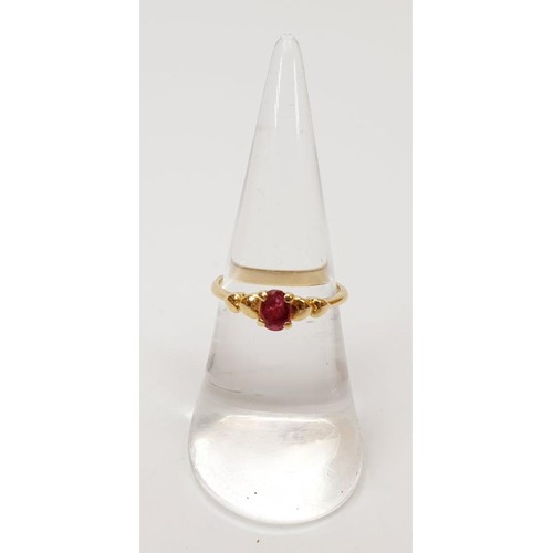 9 - A 14ct gold ring set with a ruby, size L, gross weight 1.7g. UK shipping £14. We combine shipping lo... 