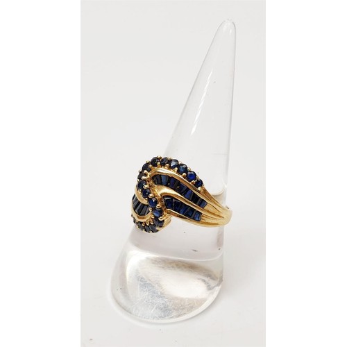 16 - A 9ct gold ring set with sapphires, size P/Q, gross weight 4.6g. UK shipping £14. We combine shippin... 