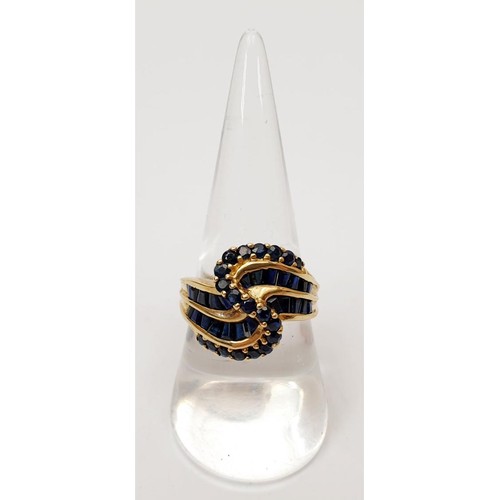 16 - A 9ct gold ring set with sapphires, size P/Q, gross weight 4.6g. UK shipping £14. We combine shippin... 