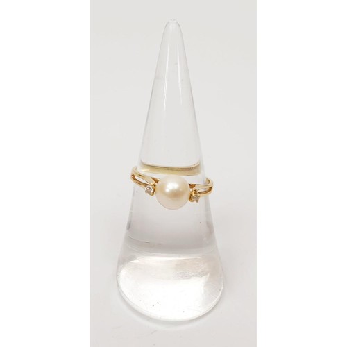 17 - A 14ct gold ring set with pearl and diamond, size L/M, gross weight 2.1g. UK shipping £14. We combin... 