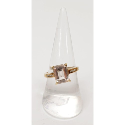 20 - A hallmarked 9ct gold ring set with morganite and diamond, size P/Q, gross weight 2.7g, with a certi... 