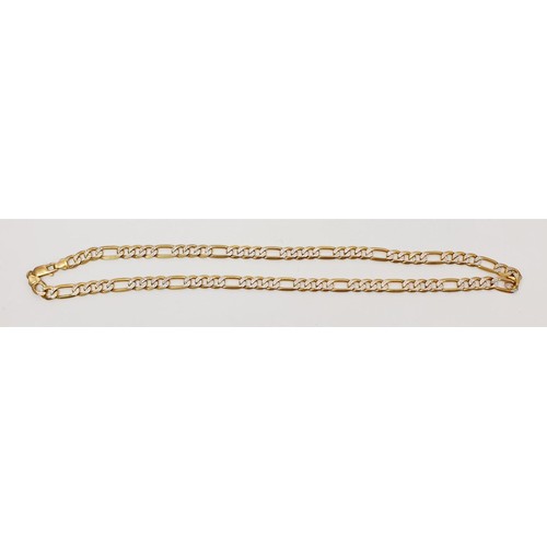 29 - A 9ct gold Figaro chain, length 24