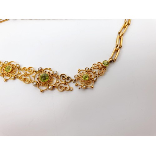 38 - An Edwardian 9ct gold bracelet set with peridot and pearl, A/F, length 6.75