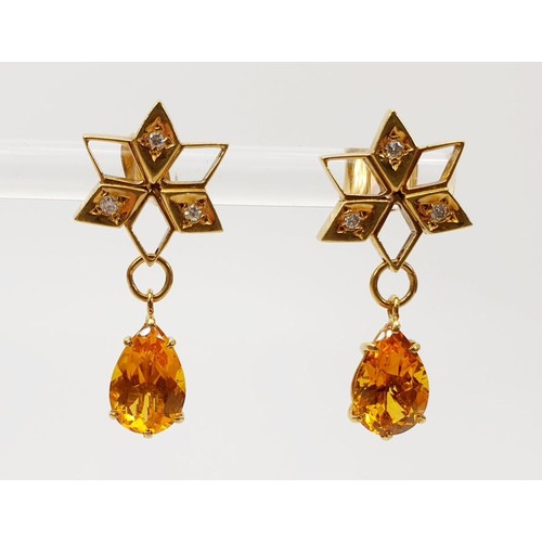 42 - A pair of hallmarked 18ct gold earrings set with citrine and diamond, length 1