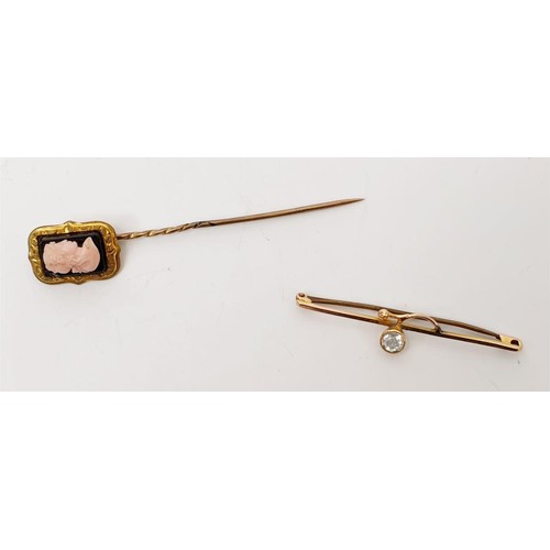 47 - A 9ct bar brooch set with a white stone, gross weight 1.2g together with an antique gold plated stic... 