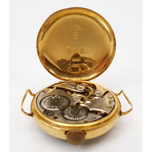 54 - An early 20th century wrist watch A/F, in an 18ct gold case, weight excluding movement 11.5g, Birmin... 