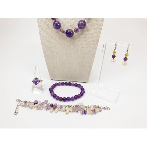 60 - A selection of amethyst and silver jewellery. UK shipping £14. We combine lots.