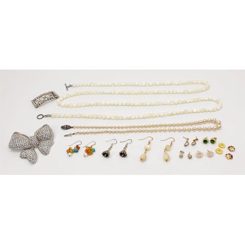 61 - A selection of costume jewellery including a mother of pearl necklace and a pair of 9ct gold earring... 