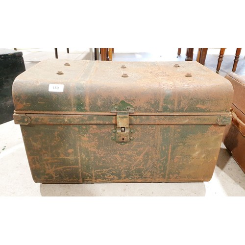 204 - An antique tin trunk, 24