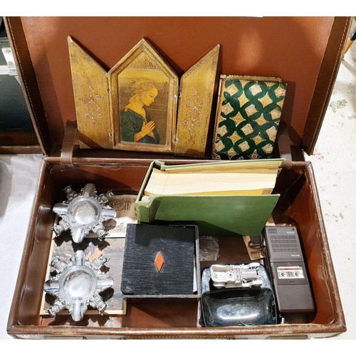 197 - A vintage leather suitcase containing a selection of collectables. No Shipping. Arrange collection o... 