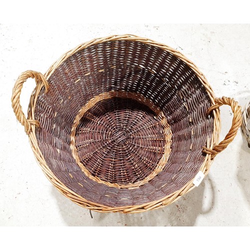 198 - A wicker log basket, diameter 21