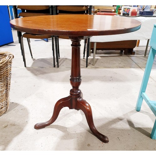 200 - A 19th century mahogany tip-up table on tripod support, diameter 26.75