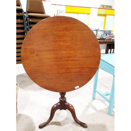 200 - A 19th century mahogany tip-up table on tripod support, diameter 26.75