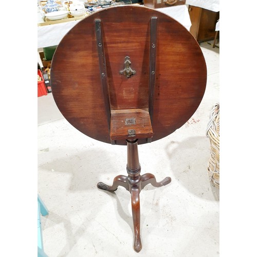 200 - A 19th century mahogany tip-up table on tripod support, diameter 26.75