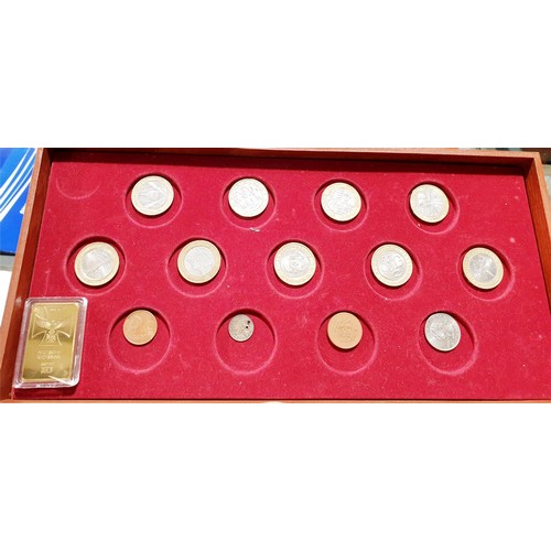 205 - A coin collector's case containing twenty eight collectable £2 coins and other coins. UK shipping £1... 