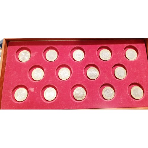 205 - A coin collector's case containing twenty eight collectable £2 coins and other coins. UK shipping £1... 