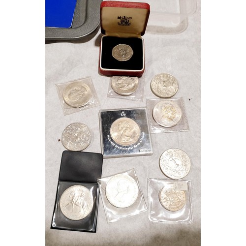 210 - A selection of foreign coins, commemorative crowns and a boxed 1973 50p. UK shipping £14.