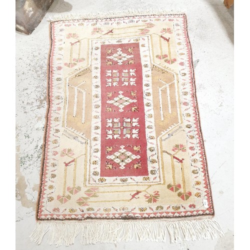 334 - A vintage Turkish hand made rug, professionally re-fringed, 56.5