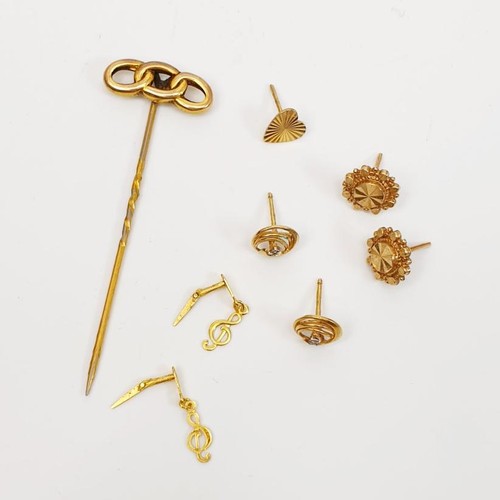 4 - A stick pin with 9ct gold motif on a gold plated pin with 9ct gold earrings together with costume je... 